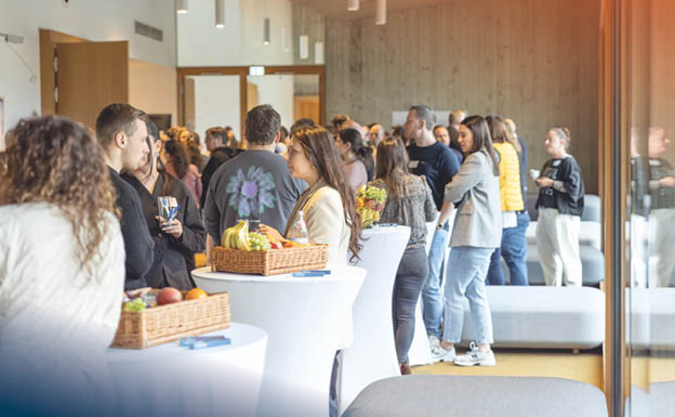marcapo employees are standing in the foyer at a staff event